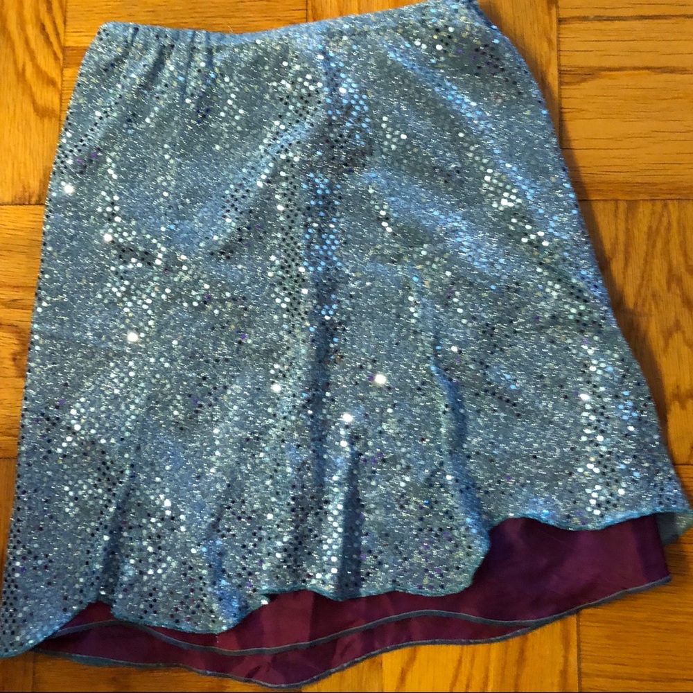 Light blue with purple sequin skirt. Small
